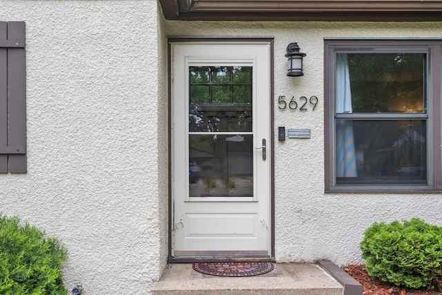 5629 35th Ave S, Minneapolis, MN 55417 - entrance to property featuring stucco siding