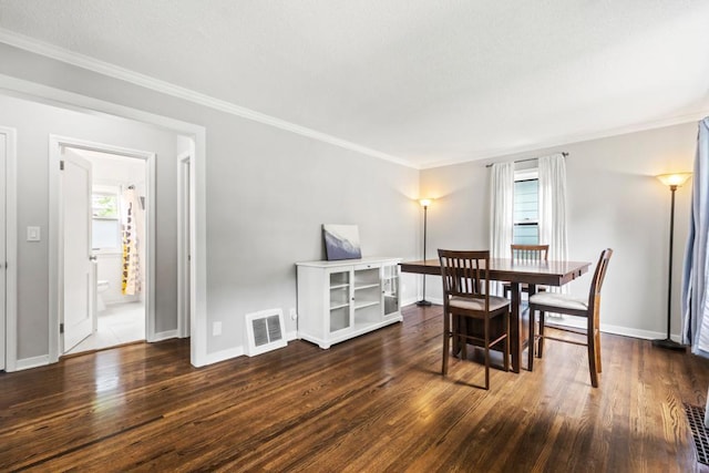 5629 35th Ave S, Minneapolis, MN 55417 - dining area with wood finished floors, crown molding, and baseboards