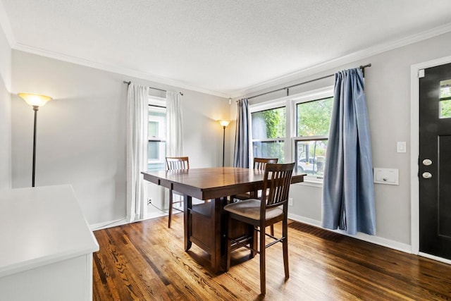 5629 35th Ave S, Minneapolis, MN 55417 - dining space with crown molding, dark wood-style floors, baseboards, and a textured ceiling