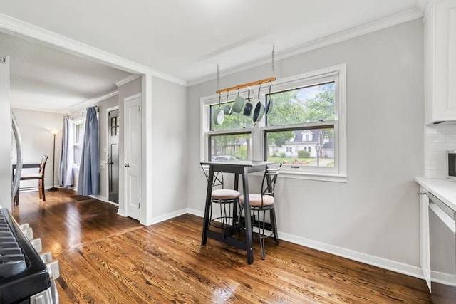 5629 35th Ave S, Minneapolis, MN 55417 - dining space featuring baseboards, wood finished floors, and crown molding