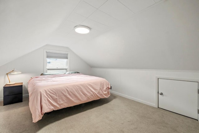5629 35th Ave S, Minneapolis, MN 55417 - carpeted bedroom featuring vaulted ceiling and baseboards