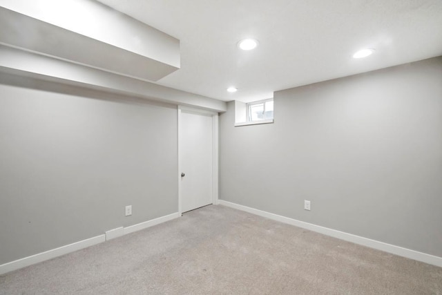 5629 35th Ave S, Minneapolis, MN 55417 - below grade area featuring light carpet, recessed lighting, and baseboards