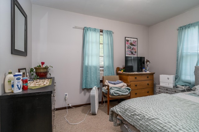 412 Hill Ave, Crookston, MN 56716 - bedroom featuring light colored carpet and baseboards