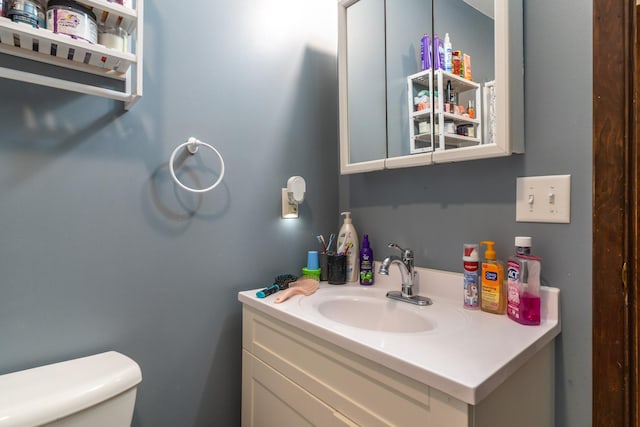 412 Hill Ave, Crookston, MN 56716 - bathroom featuring toilet and vanity