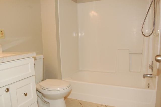 7600 157th St W Unit 307, Apple Valley, MN 55124 - bathroom featuring tile patterned flooring, vanity, toilet, and shower / bathtub combination