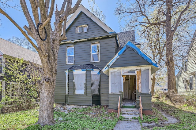 2217 Fremont Ave N, Minneapolis, MN 55411 - view of front of home featuring roof with shingles