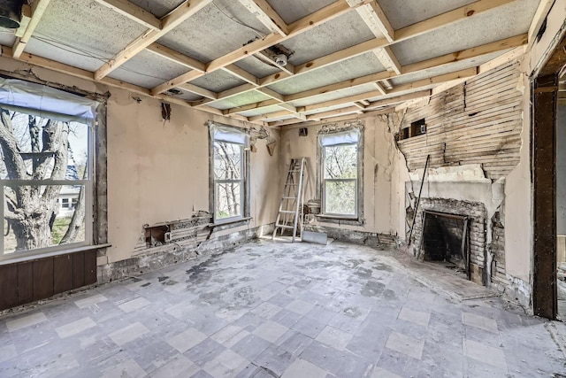 2217 Fremont Ave N, Minneapolis, MN 55411 - unfurnished living room featuring a fireplace