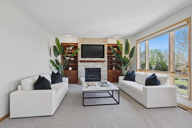 2464 Cottage Grove Dr, Woodbury, MN 55129 - carpeted living area with plenty of natural light, baseboards, and a stone fireplace
