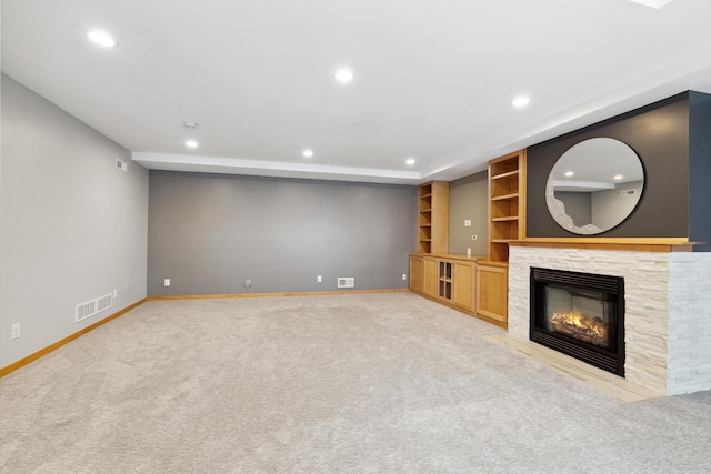 2464 Cottage Grove Dr, Woodbury, MN 55129 - unfurnished living room featuring recessed lighting, baseboards, a fireplace, light carpet, and built in features