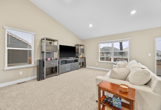 12262 71st St NE, Otsego, MN 55330 - carpeted living room featuring baseboards, recessed lighting, and vaulted ceiling