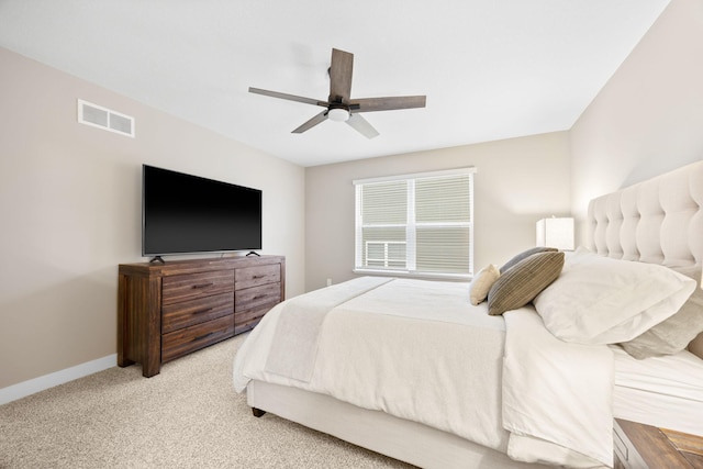 12262 71st St NE, Otsego, MN 55330 - bedroom with light carpet, baseboards, and ceiling fan