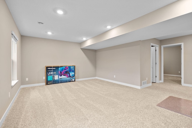12262 71st St NE, Otsego, MN 55330 - unfurnished living room with carpet floors, baseboards, and recessed lighting