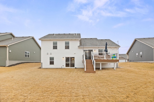 12262 71st St NE, Otsego, MN 55330 - rear view of property featuring stairs, a wooden deck, and a lawn