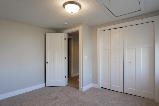 1602 Johnson St NE, Minneapolis, MN 55413 - unfurnished bedroom featuring carpet flooring, a closet, and baseboards