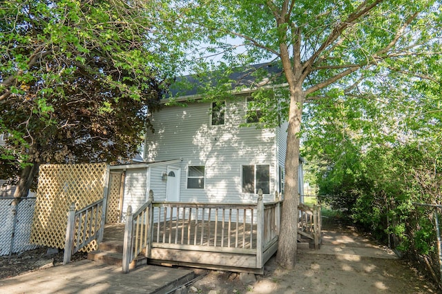 1602 Johnson St NE, Minneapolis, MN 55413 - rear view of property featuring a deck and fence