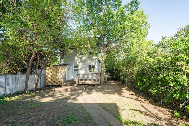 1602 Johnson St NE, Minneapolis, MN 55413 - view of yard with fence and a deck