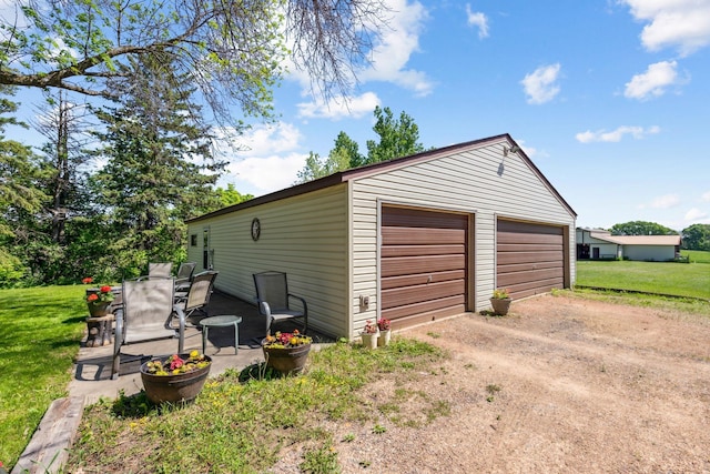 6420 Rolling Hills Rd, Corcoran, MN 55340 - detached garage with dirt driveway