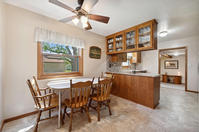 6420 Rolling Hills Rd, Corcoran, MN 55340 - dining space with baseboards and a ceiling fan