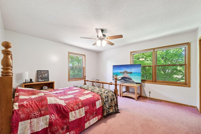 6420 Rolling Hills Rd, Corcoran, MN 55340 - bedroom featuring carpet flooring, a textured ceiling, and ceiling fan