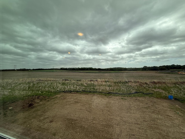 view of yard featuring a view of countryside