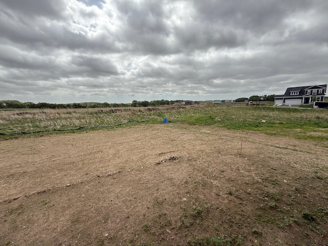 view of yard featuring a view of countryside