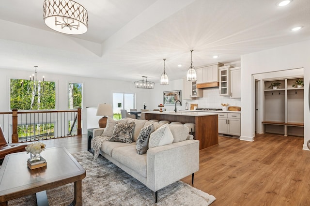 14633 Packard St NE, Ham Lake, MN 55304 - living area with a chandelier, recessed lighting, and light wood finished floors