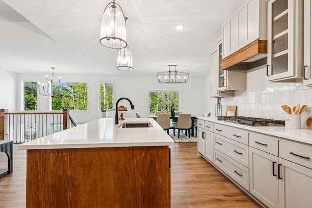 14633 Packard St NE, Ham Lake, MN 55304 - kitchen featuring a chandelier, plenty of natural light, light countertops, and recessed lighting