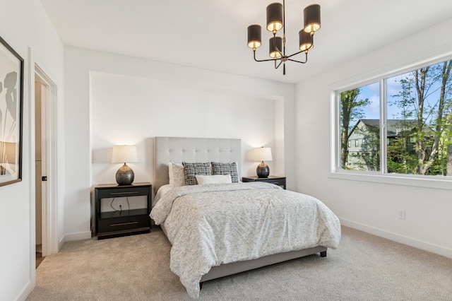 14633 Packard St NE, Ham Lake, MN 55304 - bedroom with light carpet and a chandelier