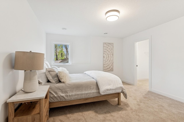 14633 Packard St NE, Ham Lake, MN 55304 - bedroom featuring light colored carpet and baseboards