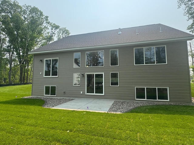 14633 Packard St NE, Ham Lake, MN 55304 - back of house featuring a yard and a patio