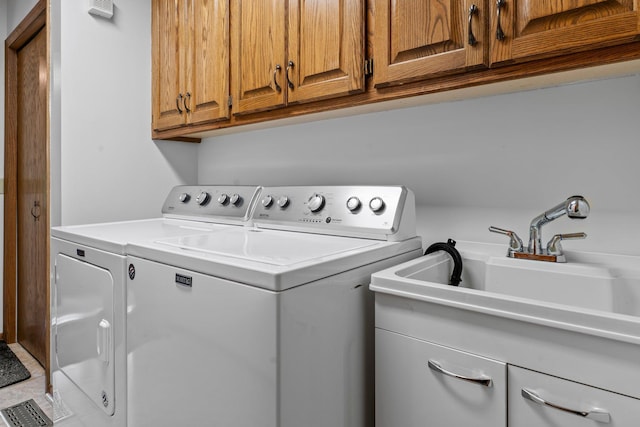 9755 Egret Blvd NW, Coon Rapids, MN 55433 - washroom featuring cabinet space and washing machine and clothes dryer