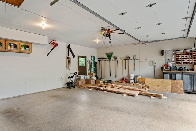 9755 Egret Blvd NW, Coon Rapids, MN 55433 - garage featuring a workshop area