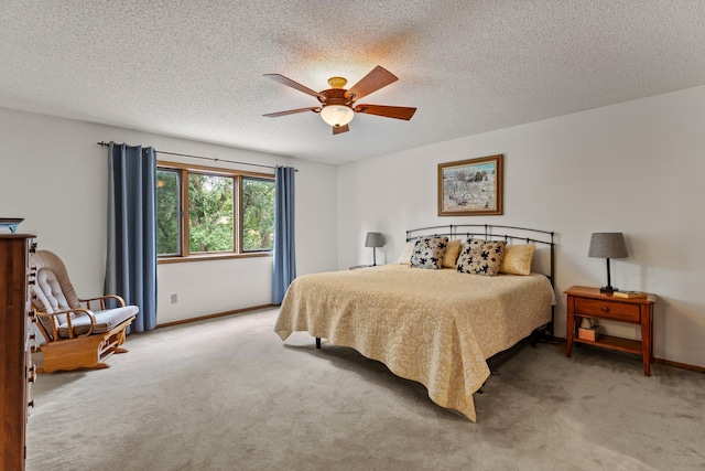 9755 Egret Blvd NW, Coon Rapids, MN 55433 - bedroom with light colored carpet, a textured ceiling, and a ceiling fan