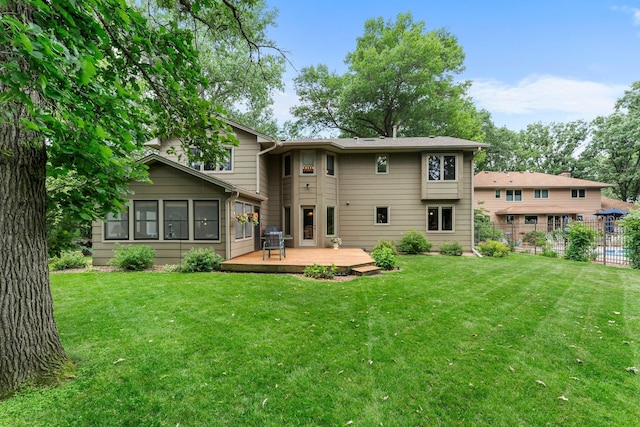9755 Egret Blvd NW, Coon Rapids, MN 55433 - back of property featuring a wooden deck