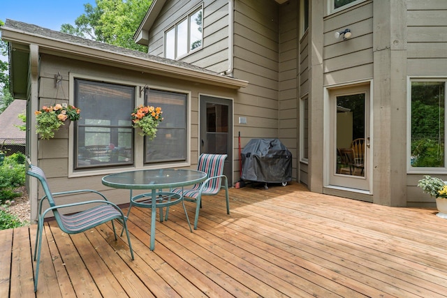9755 Egret Blvd NW, Coon Rapids, MN 55433 - deck with grilling area and outdoor dining area