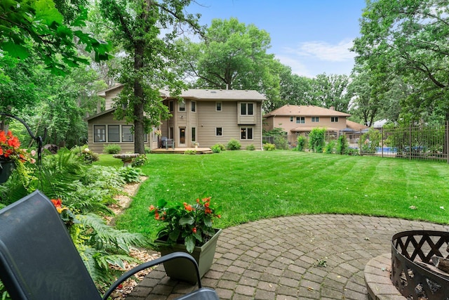 9755 Egret Blvd NW, Coon Rapids, MN 55433 - view of yard with a patio