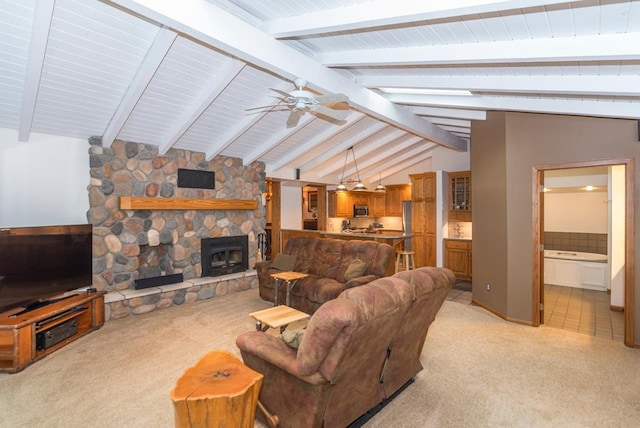 22855 Lake Hubert Dr, Lake Edward Twp, MN 56401 - living area with light colored carpet, a ceiling fan, and a fireplace