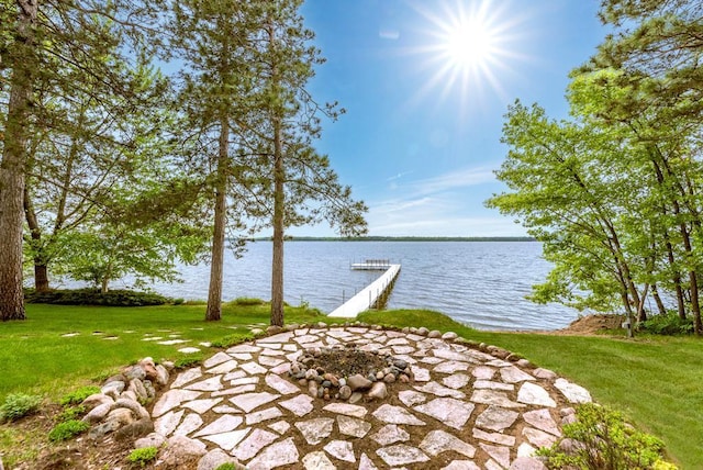 22855 Lake Hubert Dr, Lake Edward Twp, MN 56401 - view of patio / terrace with a boat dock and a water view