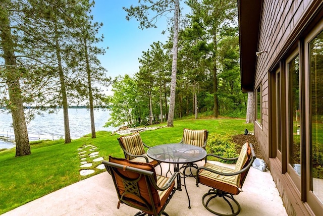 22855 Lake Hubert Dr, Lake Edward Twp, MN 56401 - view of patio / terrace featuring a water view and outdoor dining area