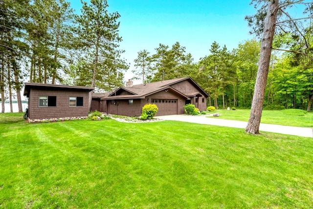 22855 Lake Hubert Dr, Lake Edward Twp, MN 56401 - view of front of property with a front lawn, a garage, driveway, and a chimney