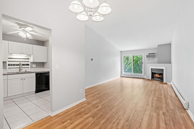 3425 Golfview Dr Unit 308, Eagan, MN 55123 - unfurnished living room featuring baseboard heating, a sink, light wood-type flooring, and a wall mounted air conditioner
