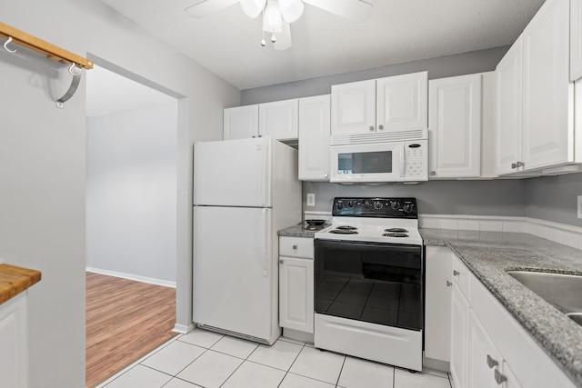 3425 Golfview Dr Unit 308, Eagan, MN 55123 - kitchen featuring white appliances, ceiling fan, white cabinets, and light tile patterned floors