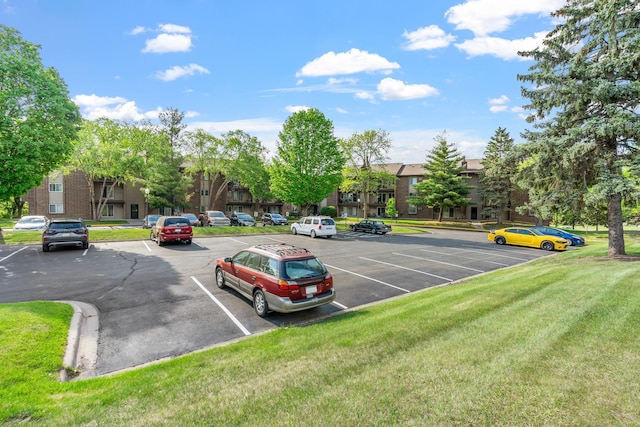 3425 Golfview Dr Unit 308, Eagan, MN 55123 - uncovered parking lot with a residential view