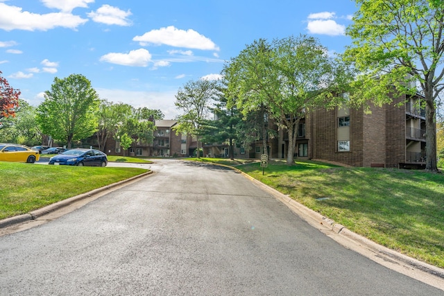 3425 Golfview Dr Unit 308, Eagan, MN 55123 - view of asphalt street with curbs and a residential view