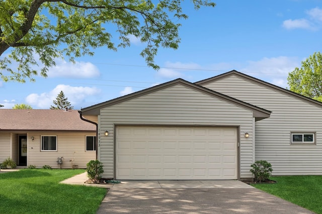 14933 Echo Way, Apple Valley, MN 55124 - ranch-style house featuring an attached garage, driveway, and a front lawn
