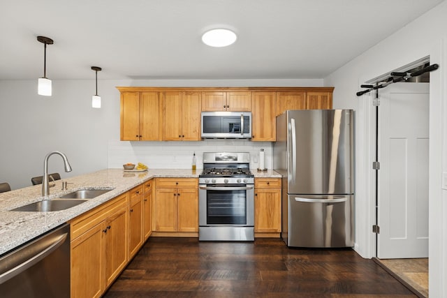 14933 Echo Way, Apple Valley, MN 55124 - kitchen with stainless steel appliances, a sink, decorative backsplash, light stone countertops, and decorative light fixtures