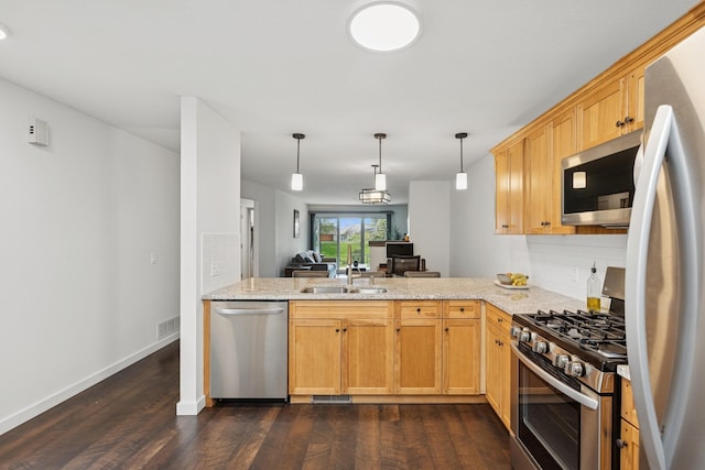 14933 Echo Way, Apple Valley, MN 55124 - kitchen with stainless steel appliances, a sink, dark wood-style floors, tasteful backsplash, and light stone countertops