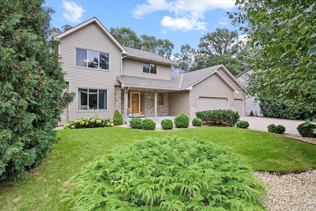 12351 Holly St NW, Coon Rapids, MN 55448 - traditional-style house with a garage, a front lawn, roof with shingles, a porch, and driveway