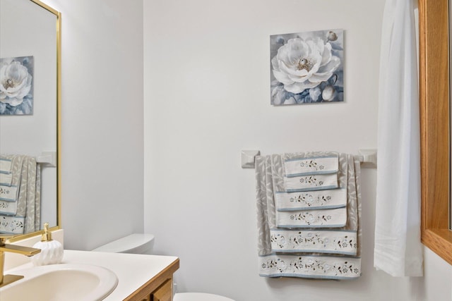 12351 Holly St NW, Coon Rapids, MN 55448 - bathroom featuring toilet and vanity