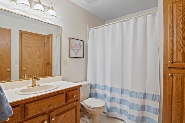 12351 Holly St NW, Coon Rapids, MN 55448 - bathroom with toilet, vanity, and curtained shower